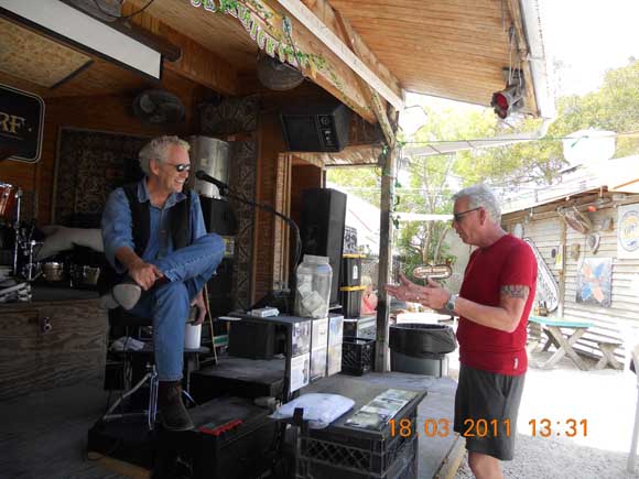 Noted artist Michael McCloud at the Schooner Wharf Bar talking to some idiot. Photo S&M Productions.