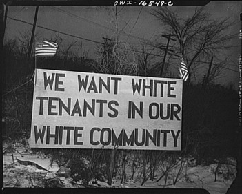 800px-White_sign_racial_hatred-070114